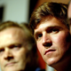 Photo: Producer Lawrence O’Donnell, moderator Tucker Carlson and Governor Mike Huckabee of Arkansas at a panel discussion August 31, 2004 in New York City (Photo by Paul Hawthorne/Getty Images)